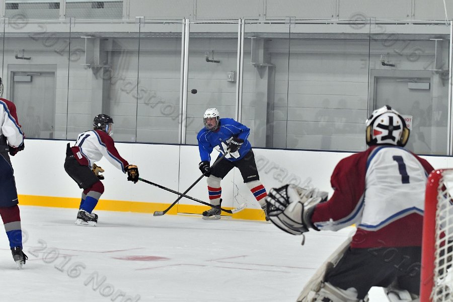 Wheaton College Men\'s Ice Hockey vs Middlesex Community College. - Photo By: KEITH NORDSTROM